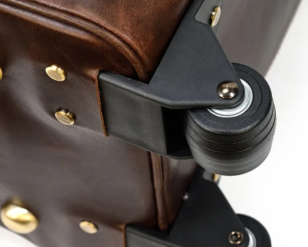 brown leather carry on bag