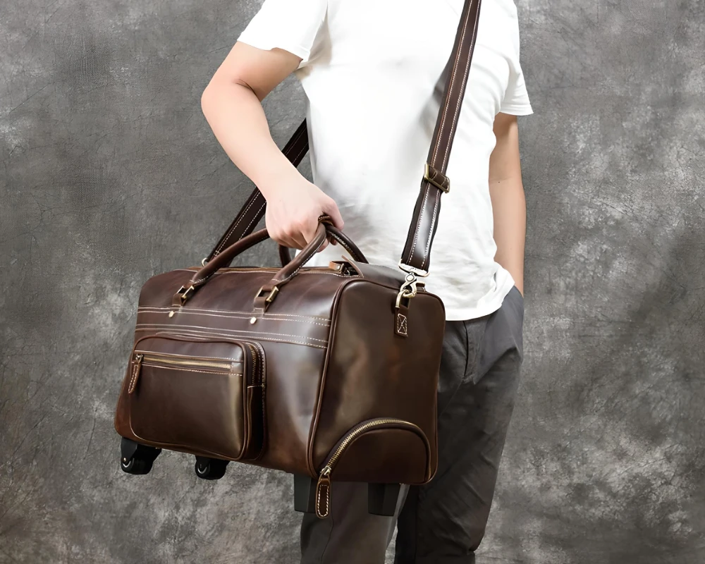 brown leather carry on bag