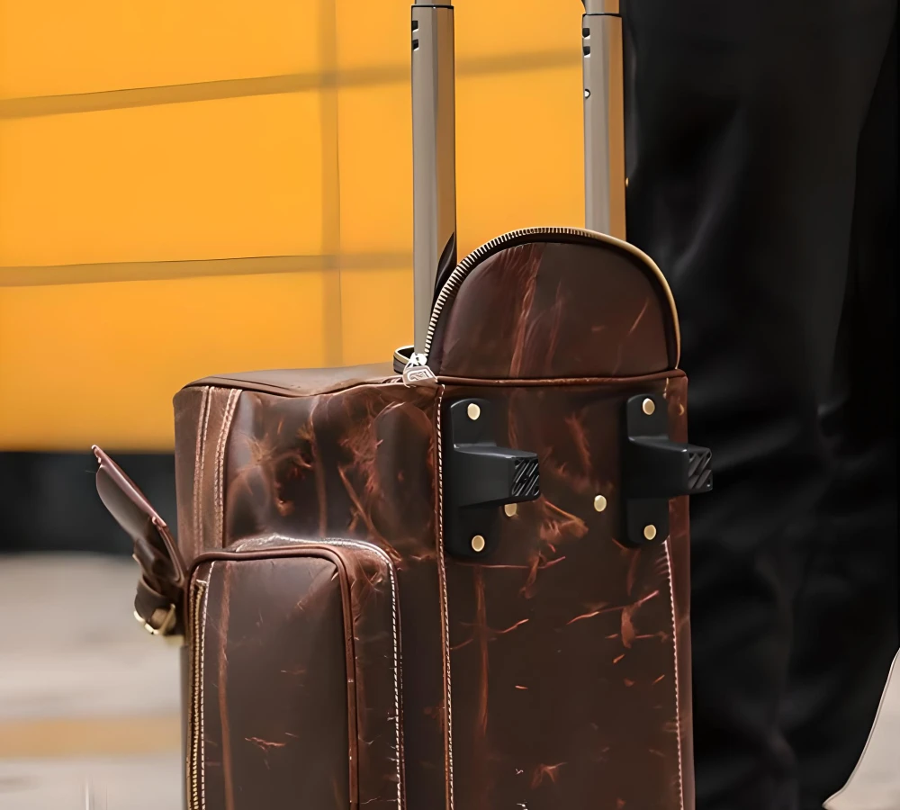 brown leather carry on bag